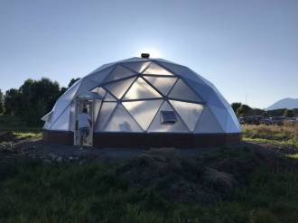 Guidestone 42' Growing Dome Greenhouse at sunset