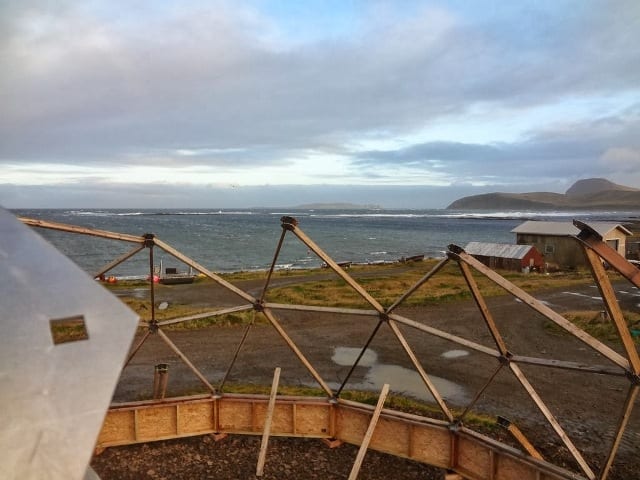 greenhouse construction with bering sea in background
