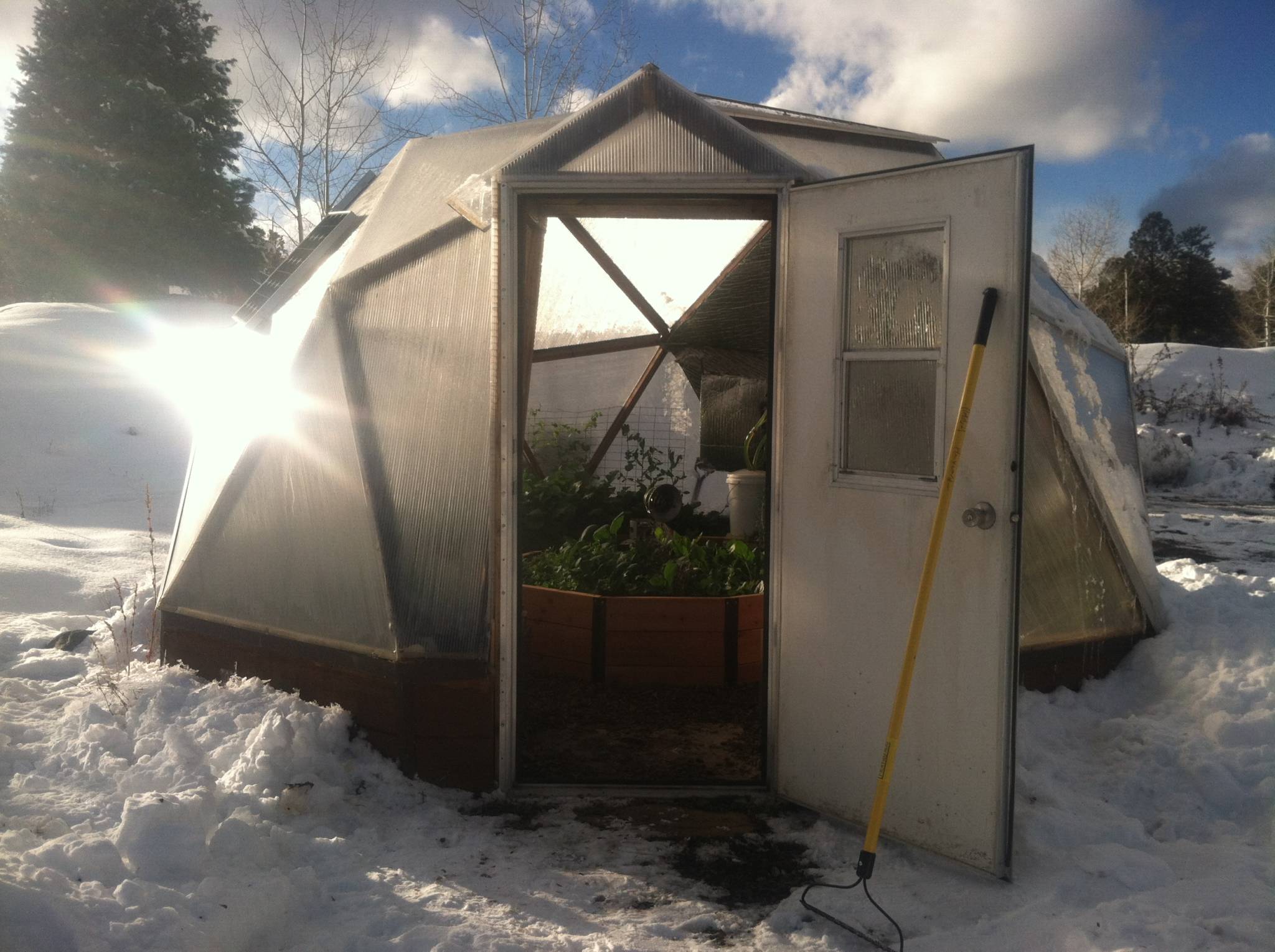 15' growing Dome greenhouse in the snow