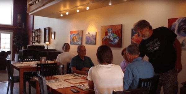 people eating breakfast in a restaurant 