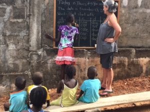 Woman teaching english in Africa