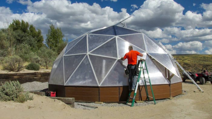 Family installing a Growing Dome