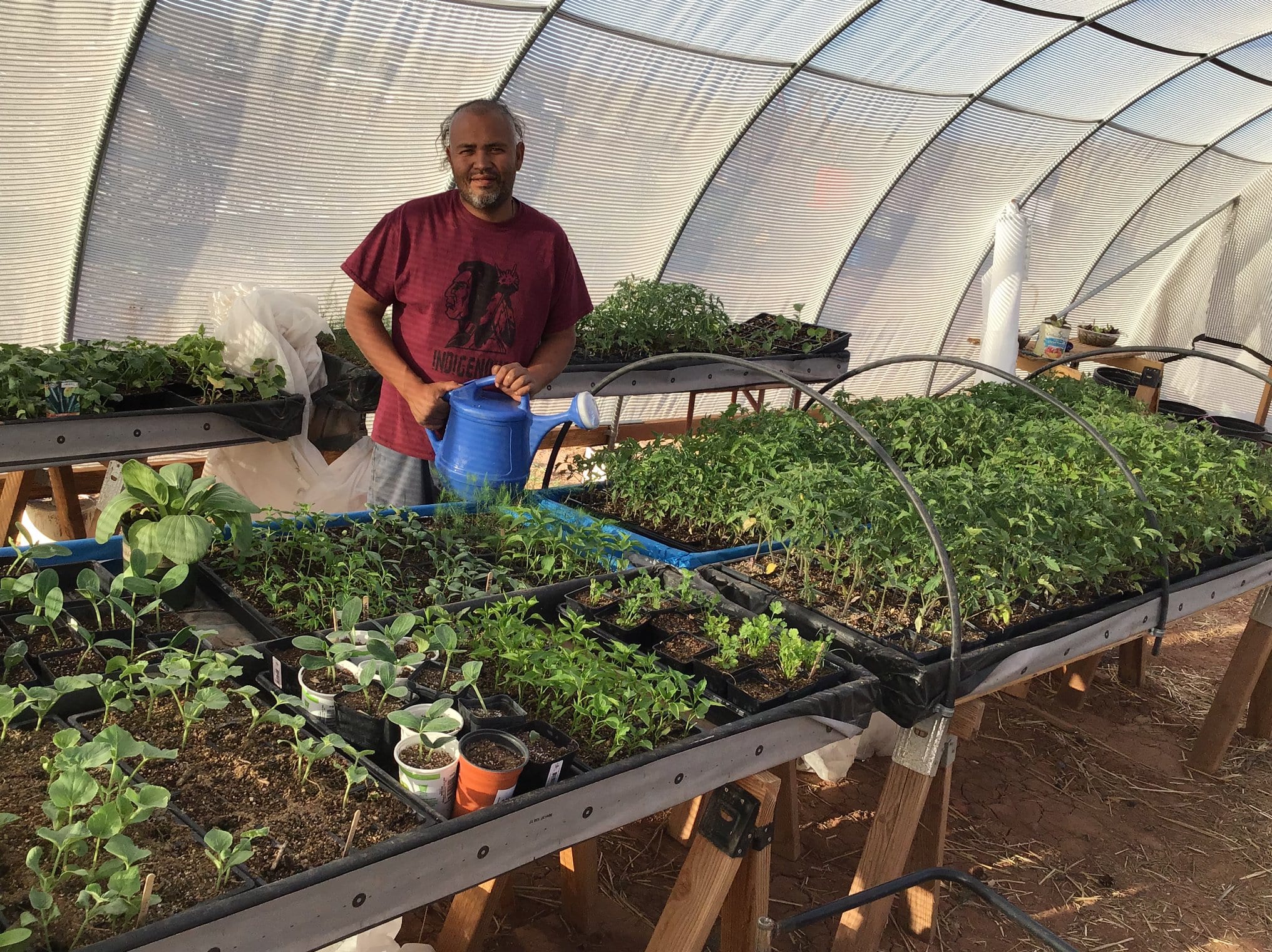Navajo Nation Tyrone Thompson in Hoop House Greenhouse