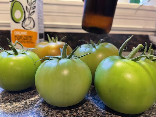 fresh green tomatoes for the greenhouse garden