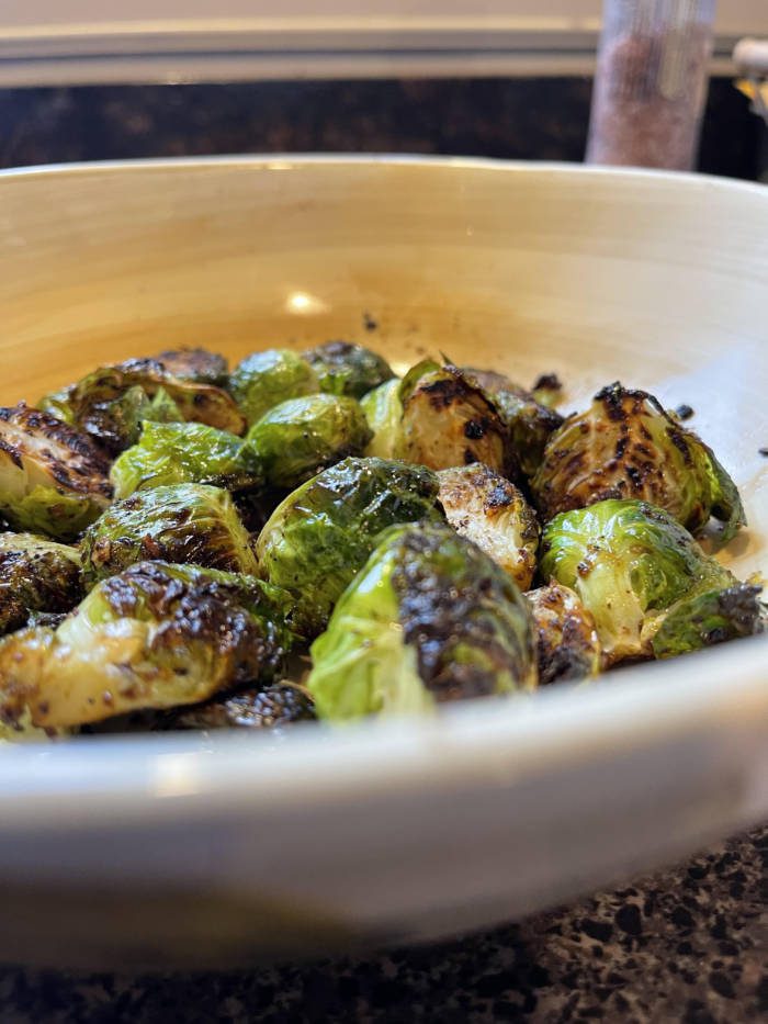 charred Brussels in a serving plate