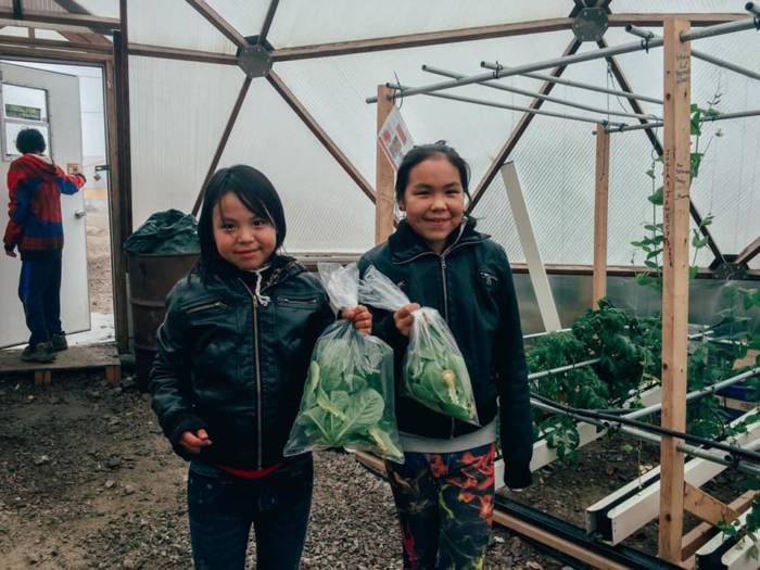 children with fresh picked produce
