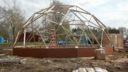 geodesic greenhouse being built