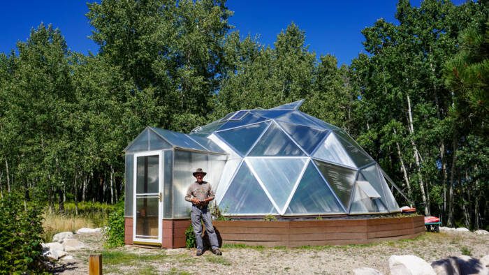 screen door on a dome greenhouse to protect from animals and rodents yet provide ventillation