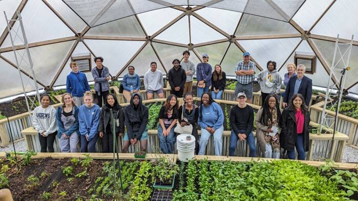 Andrew's University students visiting Unity Gardens Growing Dome