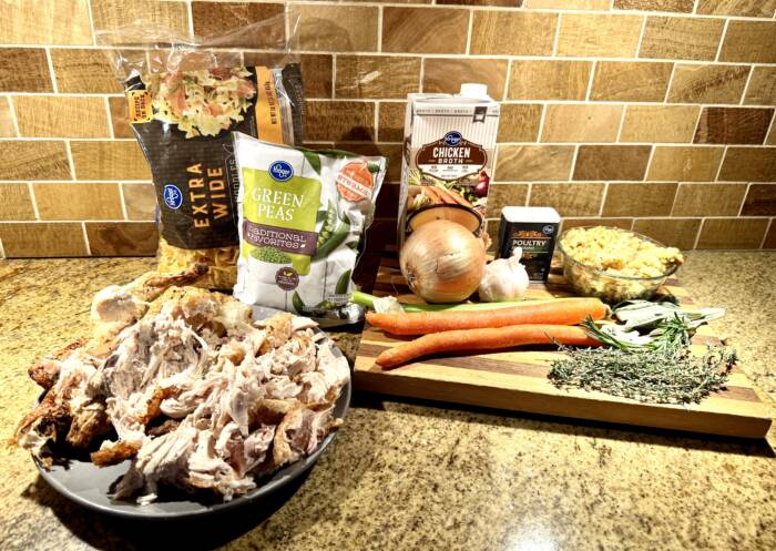 Ingredients for leftover turkey soup laid out and ready for cooking. This photo substitutes chicken for turkey. 