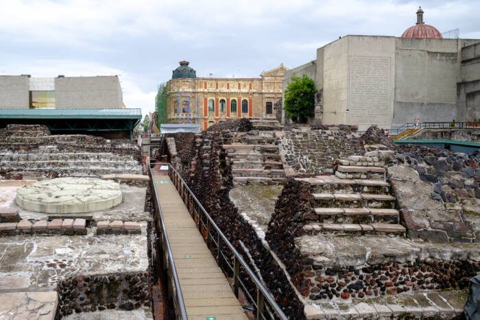 Ruins of the Aztec city of Tenochtitlan surrounded by modern buildings in Mexico City